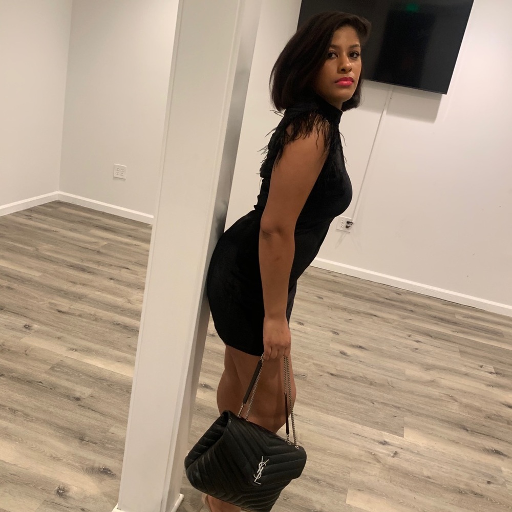 Black dress with feather sleeves